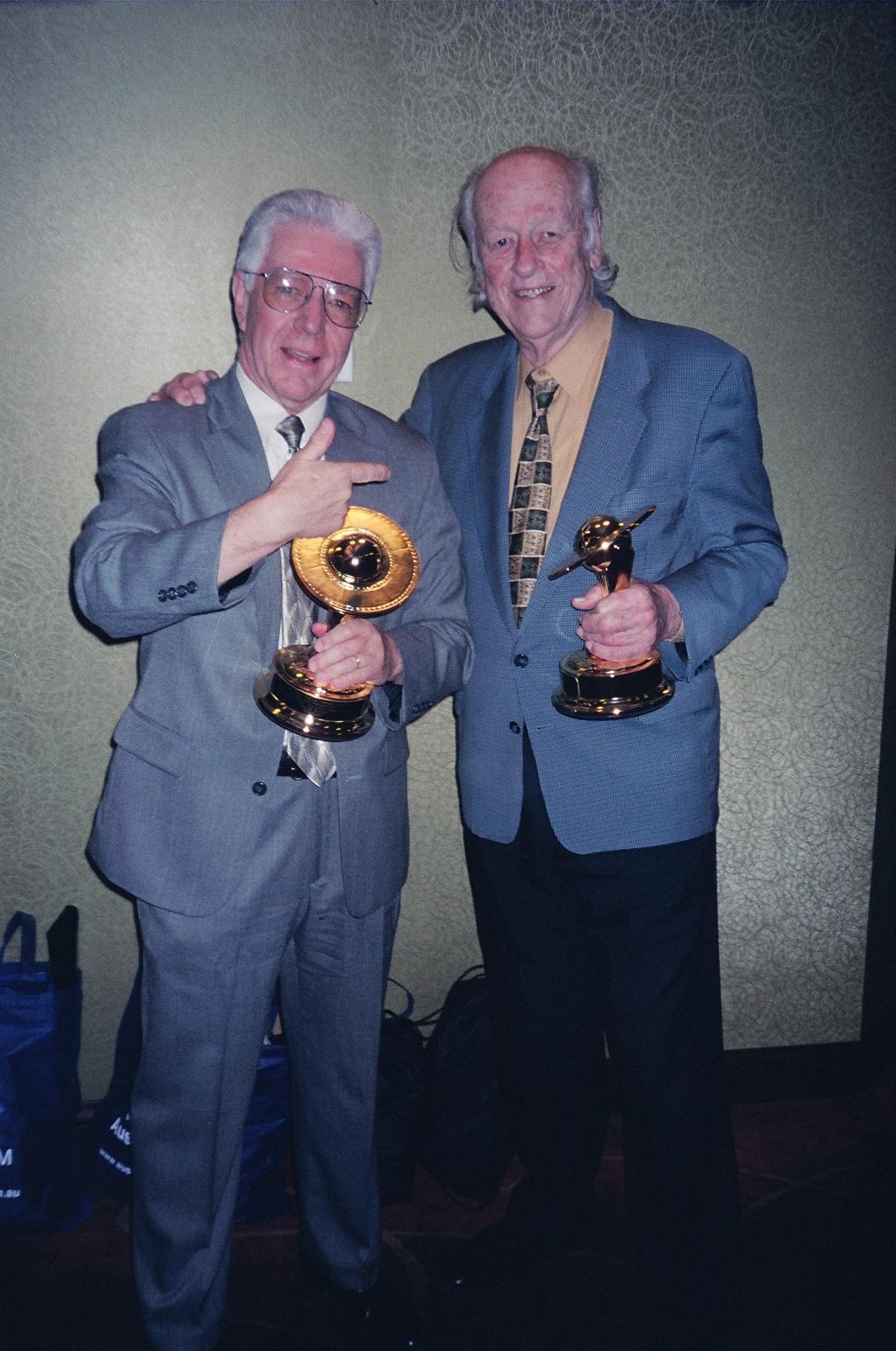 Arnold and Ray Harryhausen holding their Saturn Awards at the annual ceremony in the spring of 2006. Arnold received his for his 