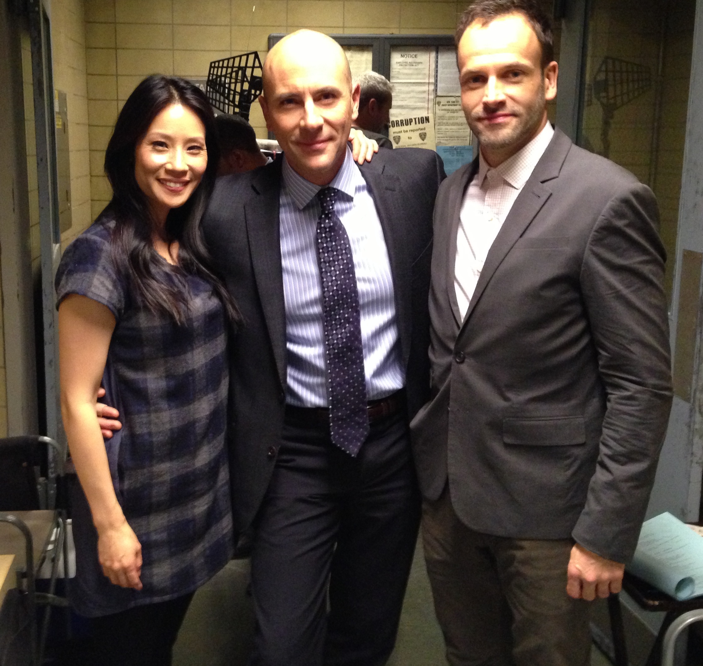 Lucy Liu, Jordan Lage, & Jonny Lee Miller on set of CBS' ELEMENTARY (2013).
