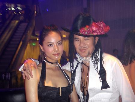 Gan with Korean pop singer Park Ji Yoon at Dior Party, Hong Kong, May 2004.