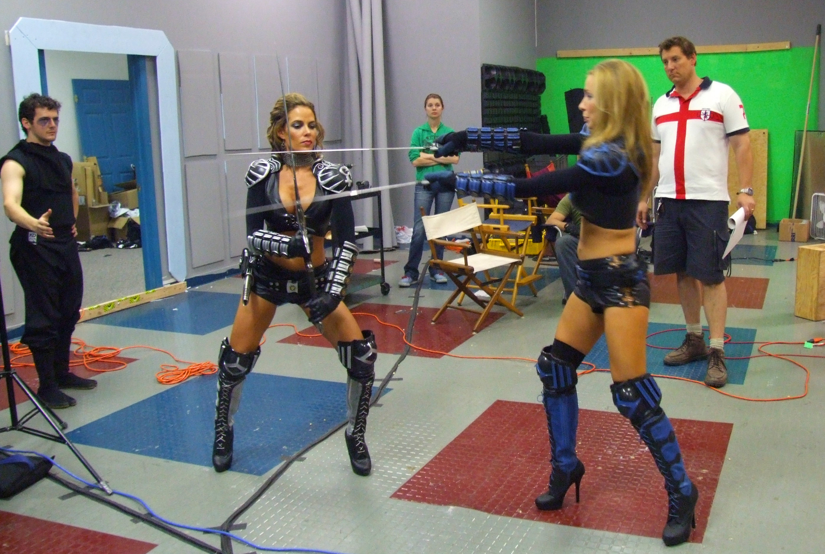 Stunt Coordinator, Adam Danoff and director, Dan Lantz work out a fight sequence with Trish Cleveland and Katy O'leary for 