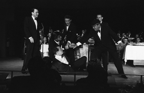 Frank Sinatra, Sammy Davis Jr., Dean Martin, Peter Lawford, Buddy Lester and Joey Bishop performing in the Copa Room at the Sands Hotel in Las Vegas