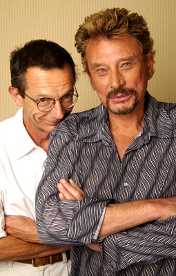 Johnny Hallyday and Patrice Leconte at event of L'homme du train (2002)