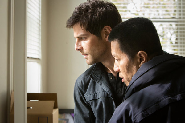 Still of Reggie Lee and David Giuntoli in Grimm (2011)