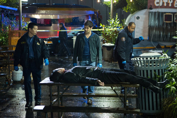 Still of Reggie Lee and David Giuntoli in Grimm (2011)