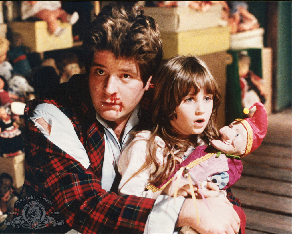 Still of Stephen Lee and Carrie Lorraine in Dolls (1987)