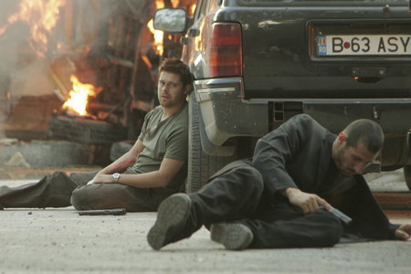 Tom Delmar Stunt Coordinator & 2nd Unit Director. Matthew Leitch (Dimitri) recovers from the blast in 'Razors Edge'.jpg