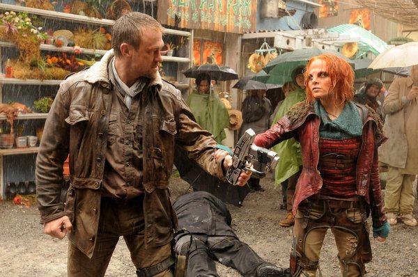 Still of Grant Bowler and Stephanie Leonidas in Defiance (2013)