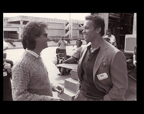 Director Mark L. Lester & Arnold Schwarzenegger on the set of 