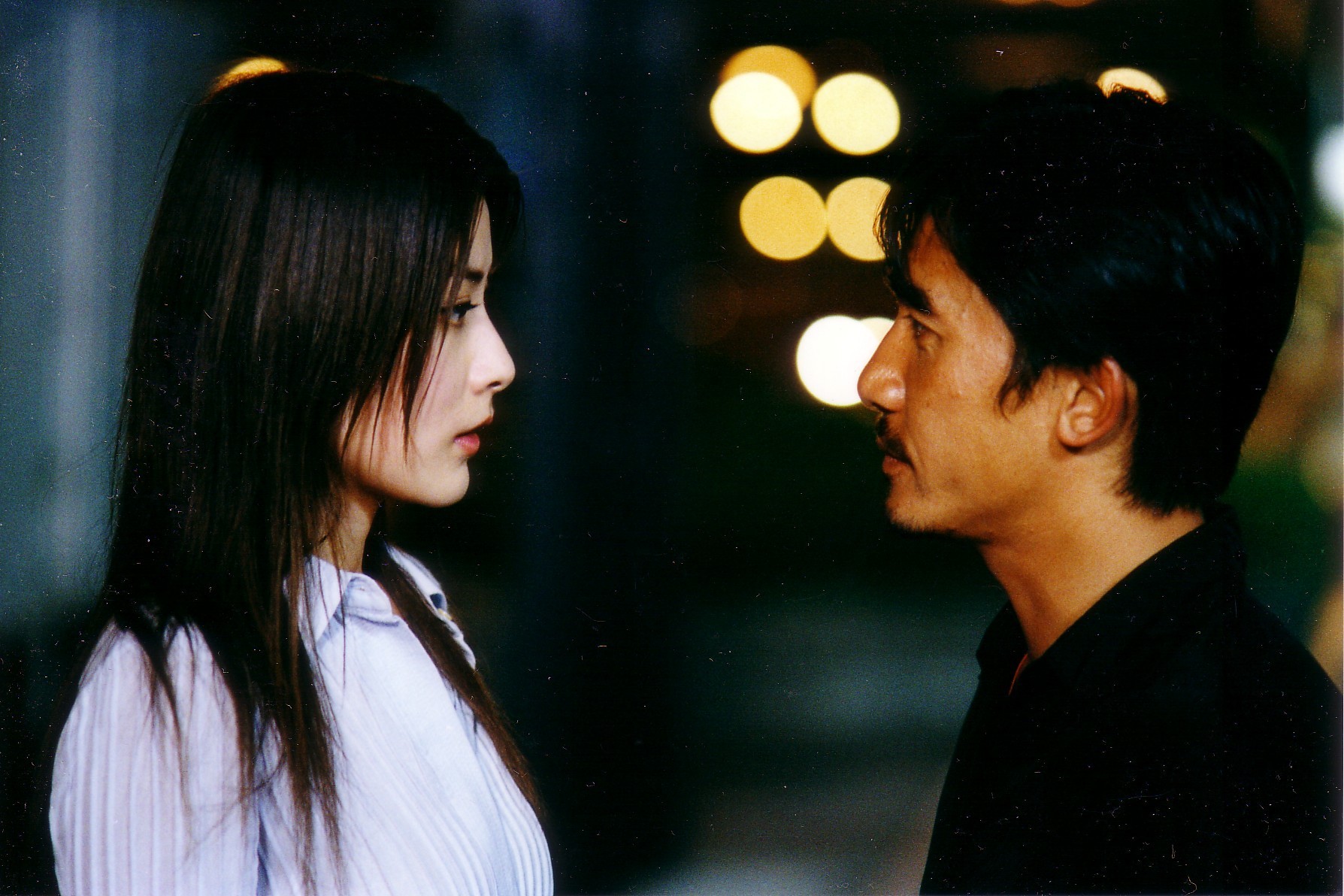 Still of Kelly Chen and Tony Chiu Wai Leung in Mou gaan dou (2002)