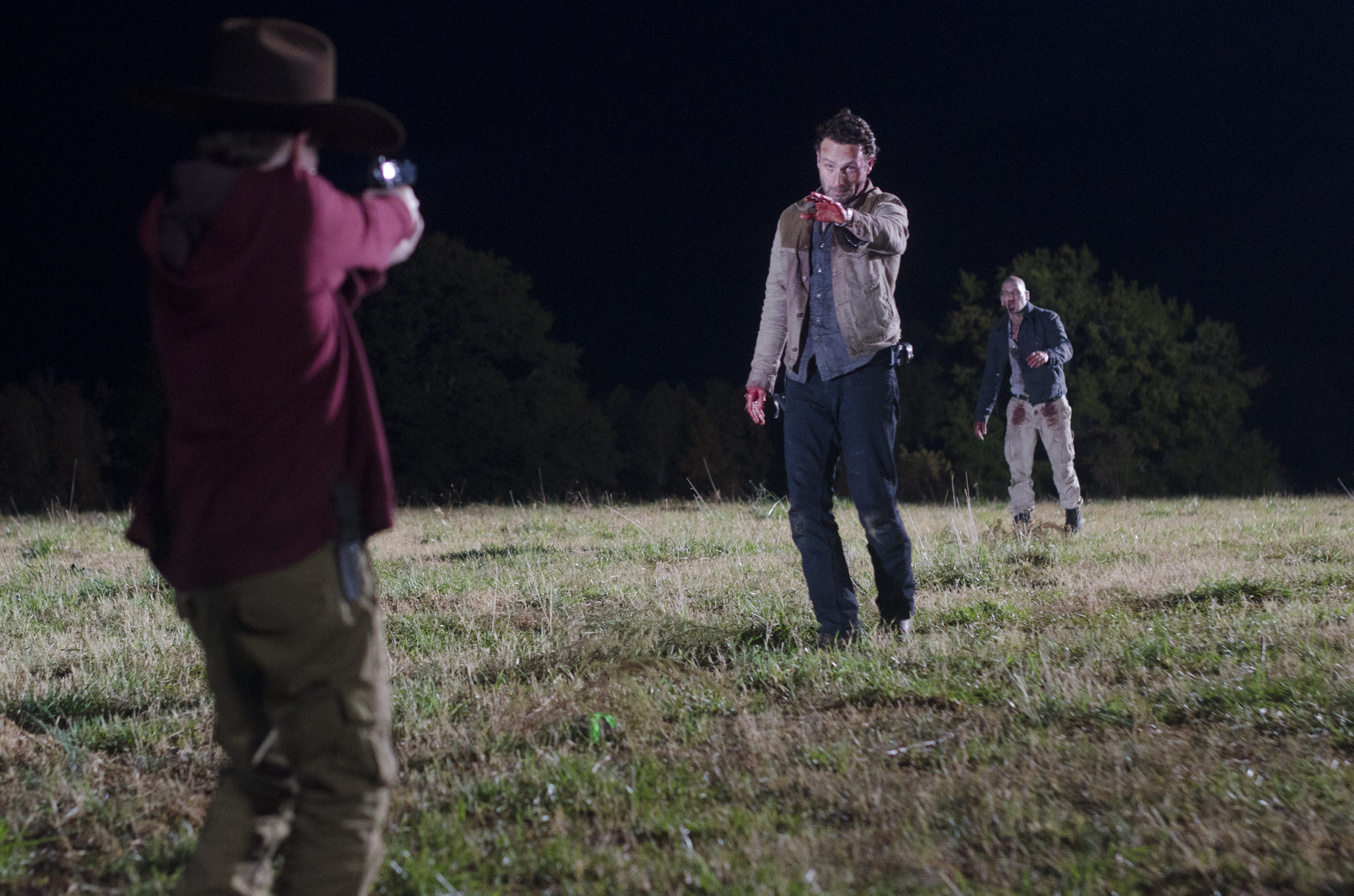 Still of Andrew Lincoln, Jon Bernthal and Chandler Riggs in Vaiksciojantys negyveliai (2010)