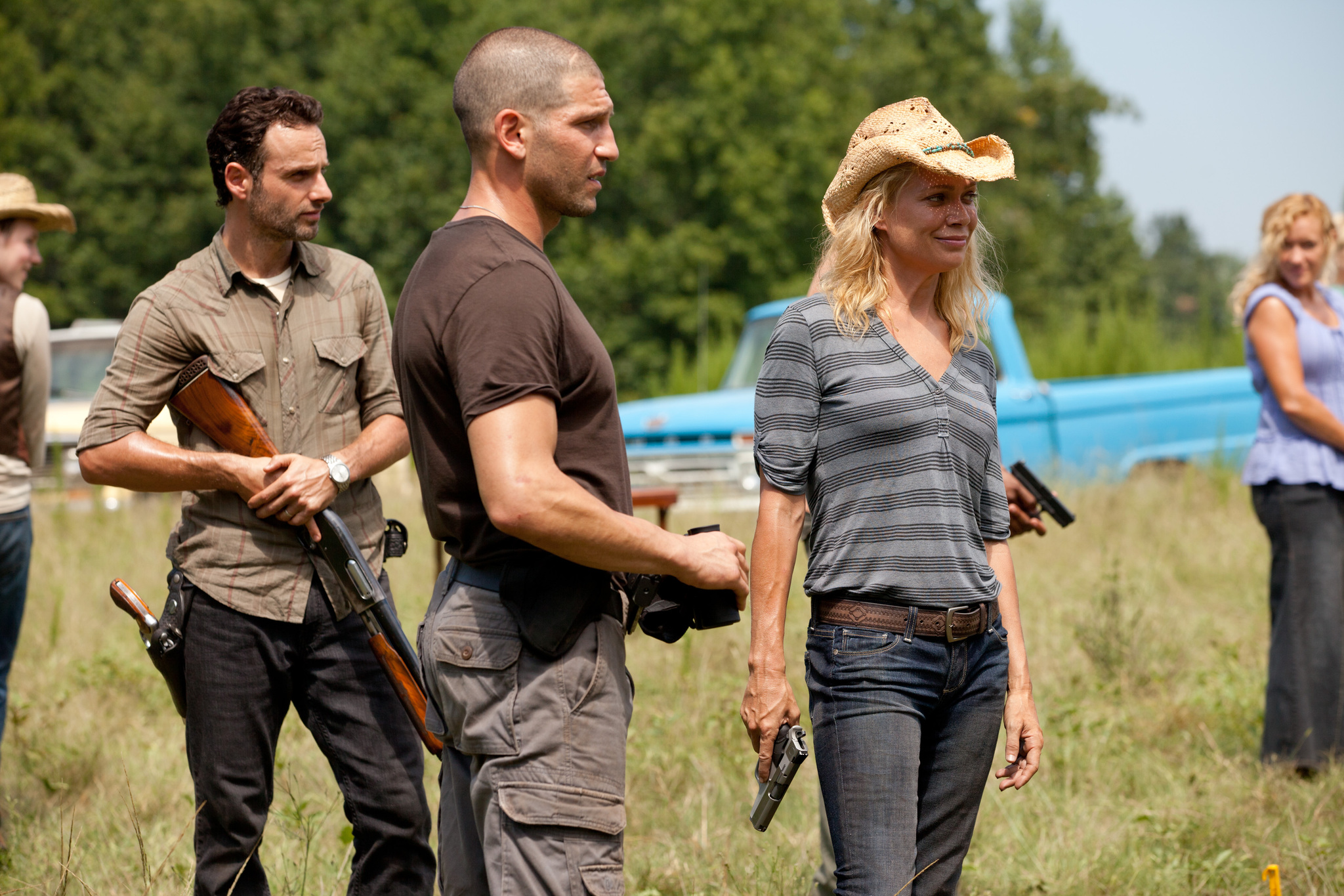 Still of Laurie Holden, Andrew Lincoln and Jon Bernthal in Vaiksciojantys negyveliai (2010)