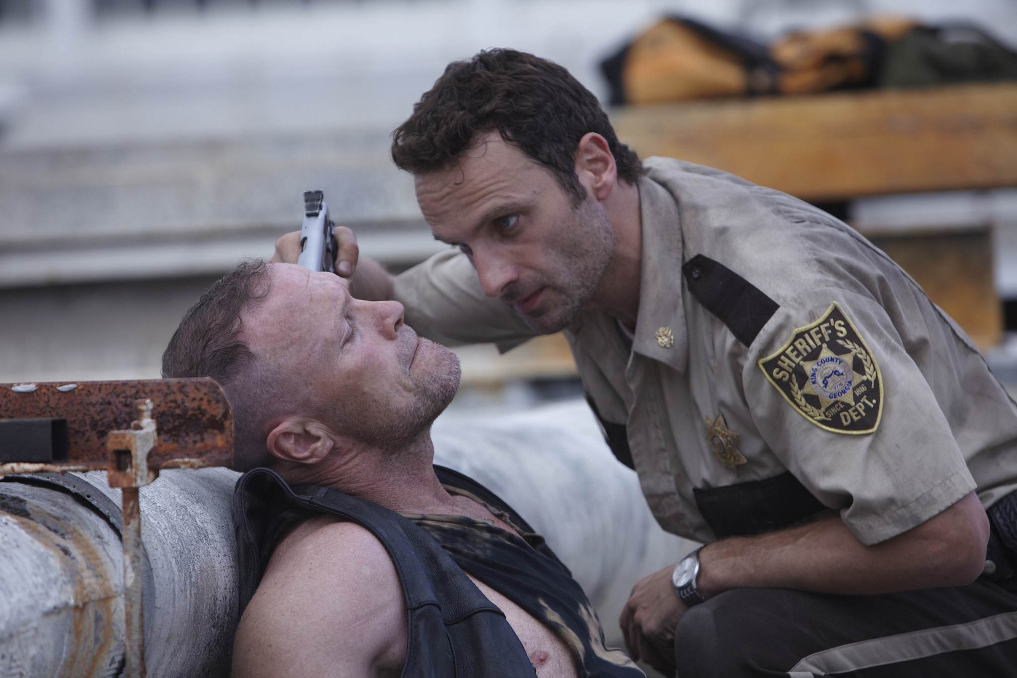 Still of Andrew Lincoln and Michael Rooker in Vaiksciojantys negyveliai (2010)