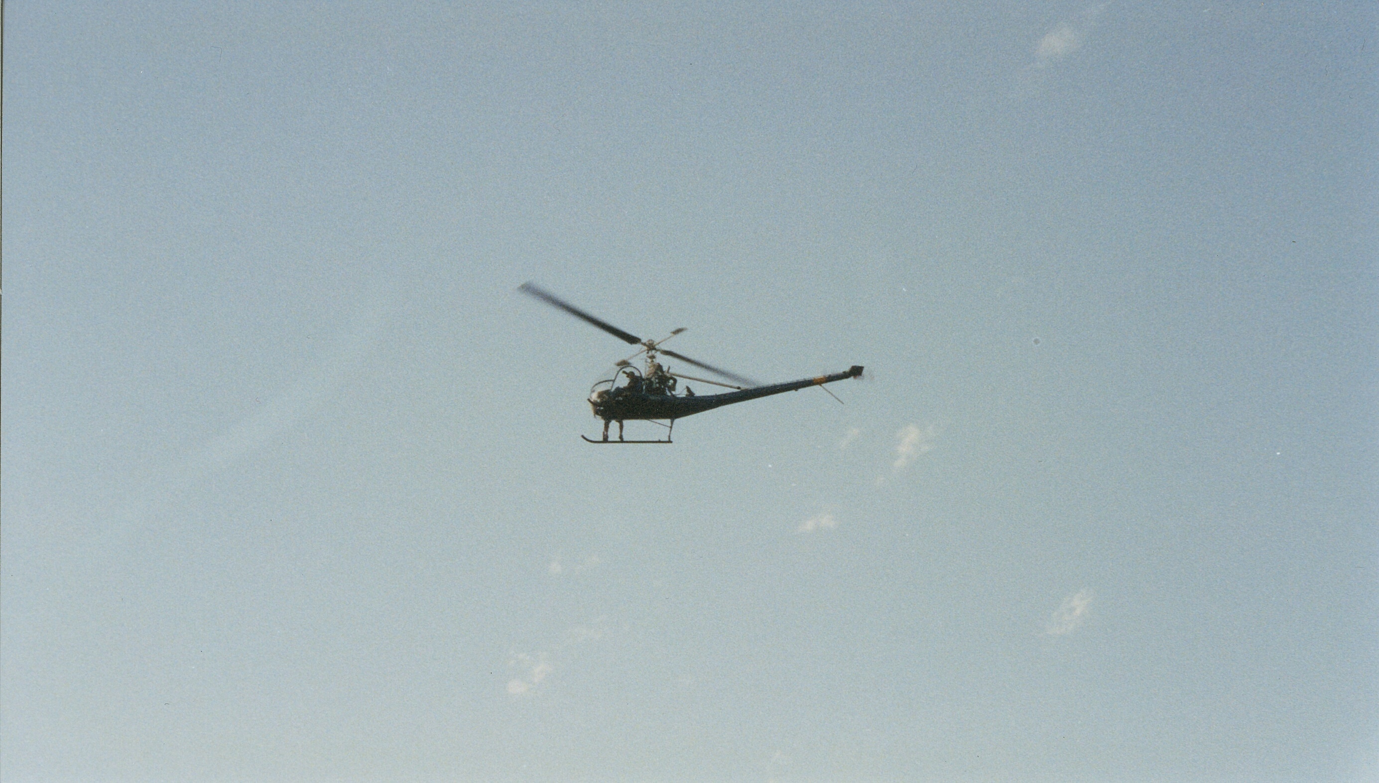 Tom Logan directing on the set of WHAT IF. (Those are his legs dangeling from the chopper!)