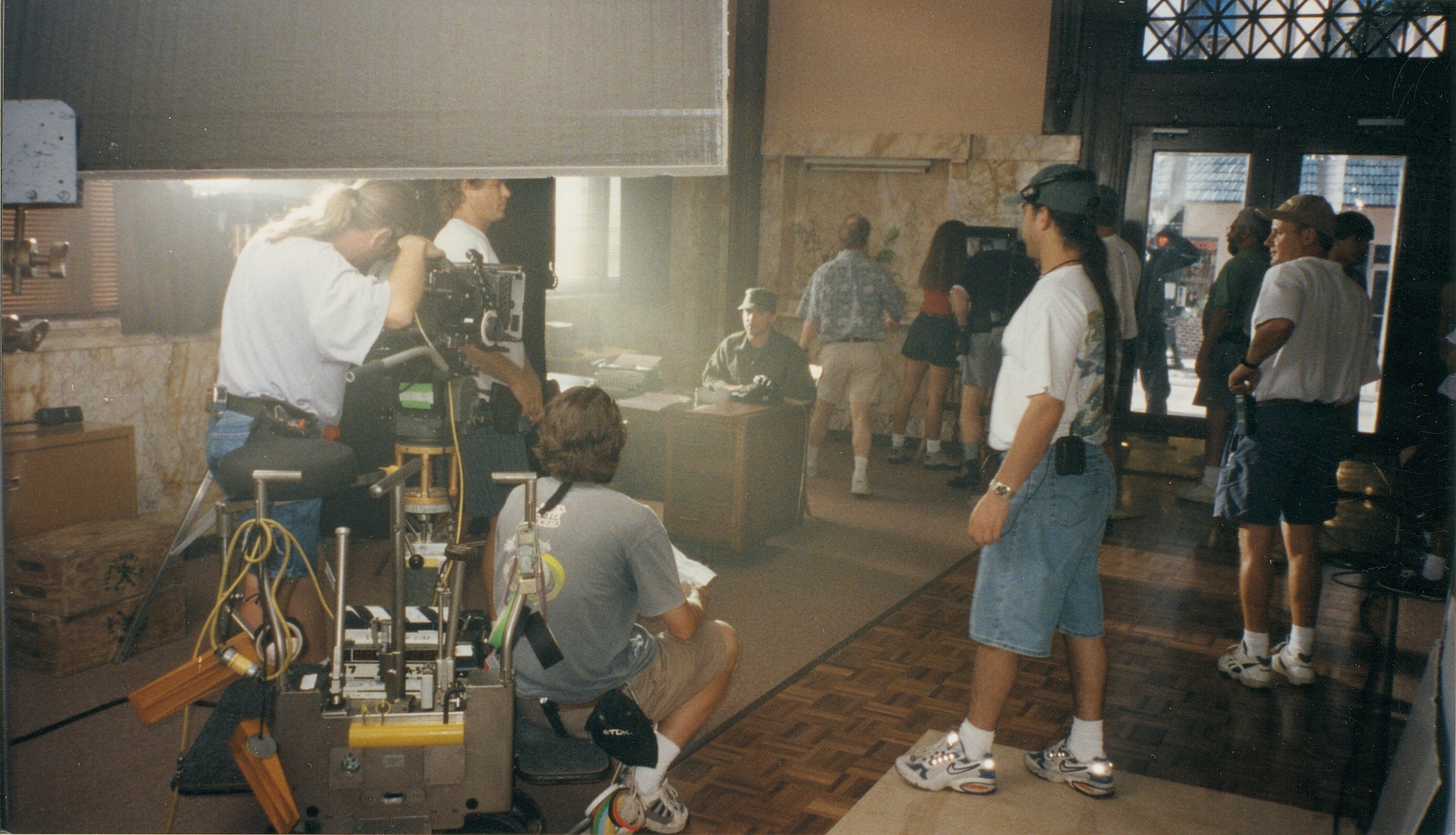 Tom Logan (back of head) directing on the set of ESCAPE FROM CUBA.