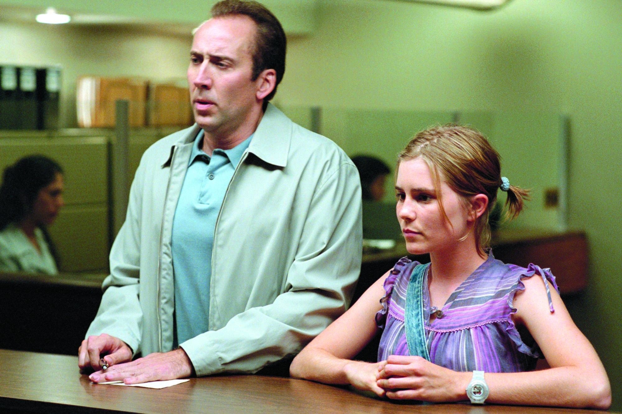 Still of Nicolas Cage and Alison Lohman in Matchstick Men (2003)