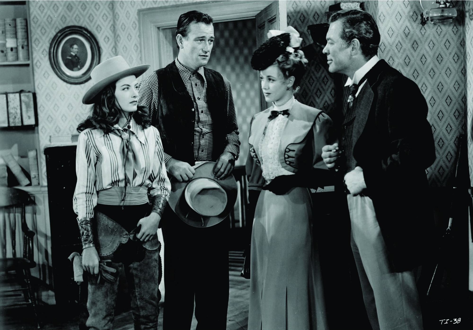Still of John Wayne, Ward Bond, Audrey Long and Ella Raines in Tall in the Saddle (1944)