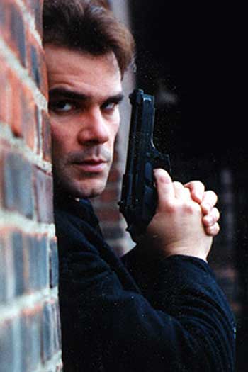 Tim Lovelace as Detective Glen Usher in 
