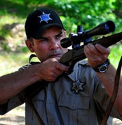 Tim Lovelace as Sheriff Tanner in Bunyan