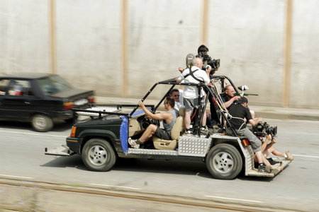 Tom Delmar Stunt Coordinator & 2nd Unit Director with Tudor Lucaciu (DOP), high speed tracking with a tracking vehicle Toms stunt crew built on location in Romania.'Razors Edge'.jpg