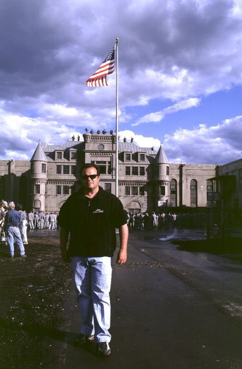 Director ROD LURIE stands in front of the historic Tennessee State Penitentiary, which served as the location set