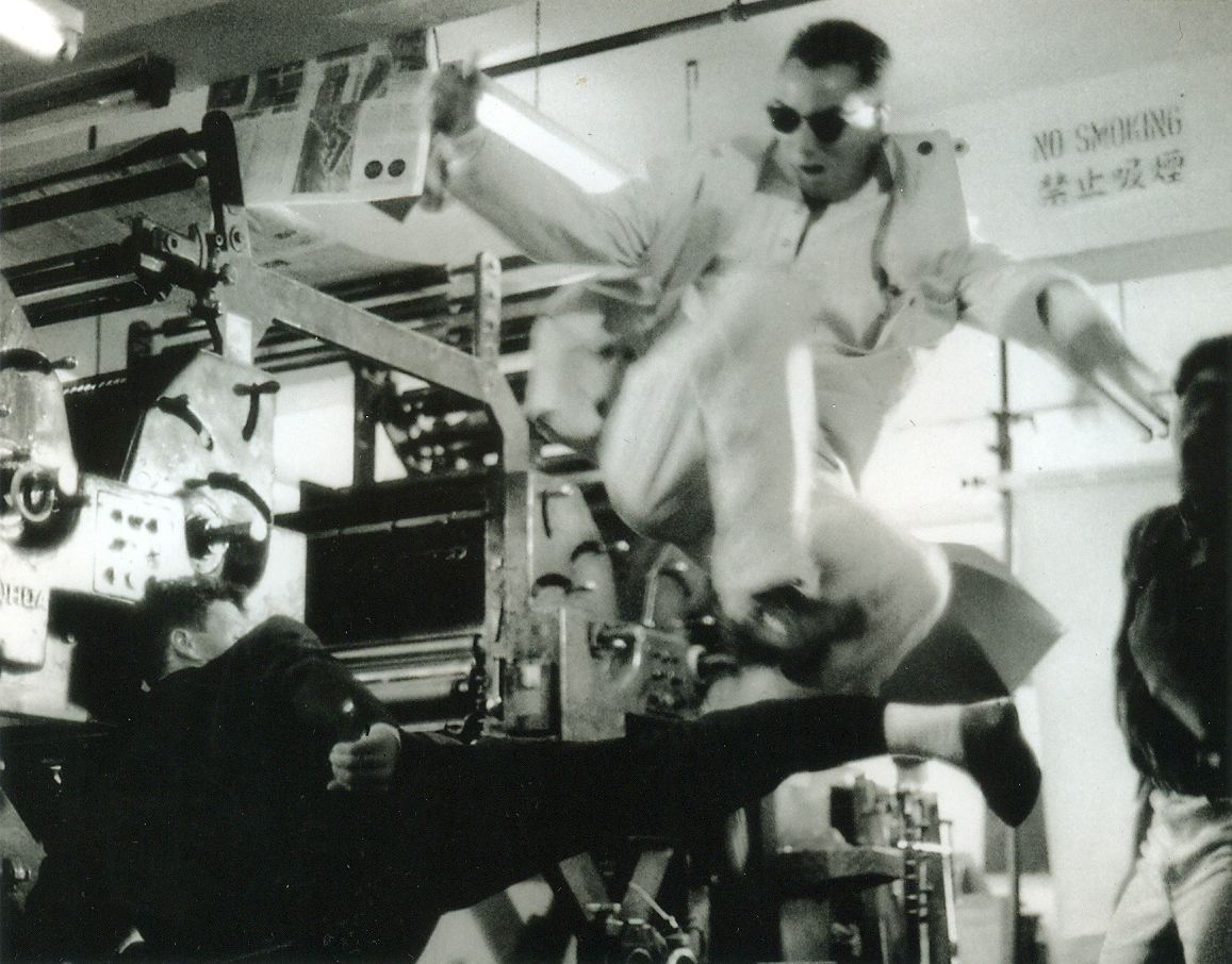 Vincent executing a flying side-kick over villain partner Jeff Falcon in the movie 