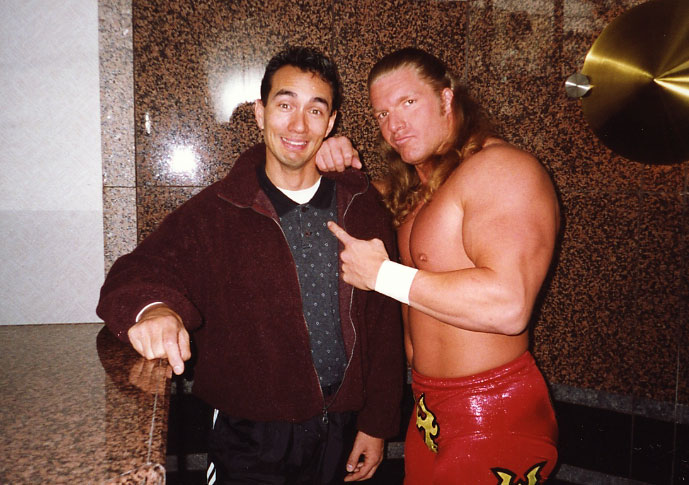 Yikes! Vincent with World Wrestling Champion Triple H.