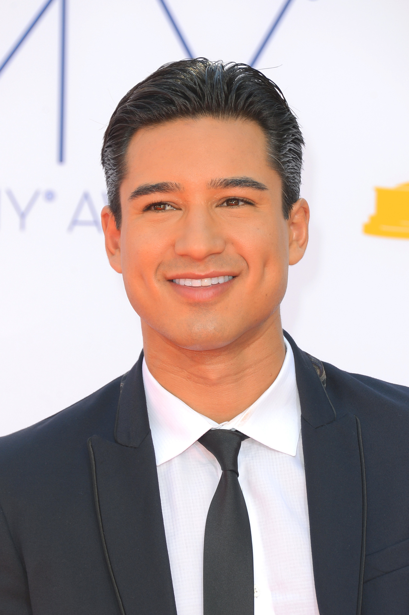 Mario Lopez at event of The 64th Primetime Emmy Awards (2012)