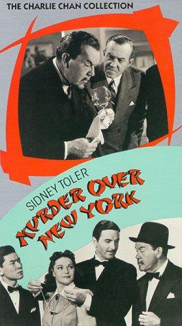 Donald MacBride, Kane Richmond, Marjorie Weaver and Victor Sen Yung in Murder Over New York (1940)