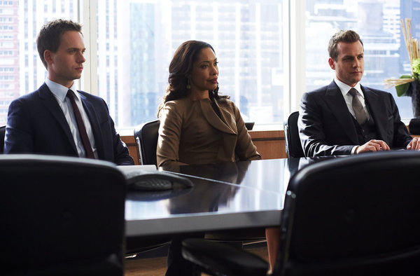 Still of Gabriel Macht and Gina Torres in Suits (2011)