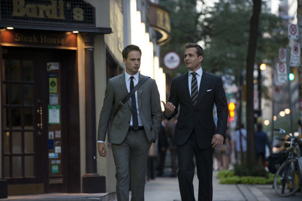 Still of Gabriel Macht and Patrick J. Adams in Suits (2011)