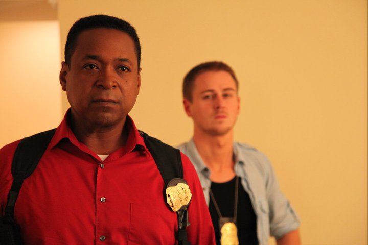 Michael Mack as Detective Mayfield in 