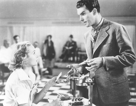 Still of Carole Lombard and Fred MacMurray in Hands Across the Table (1935)