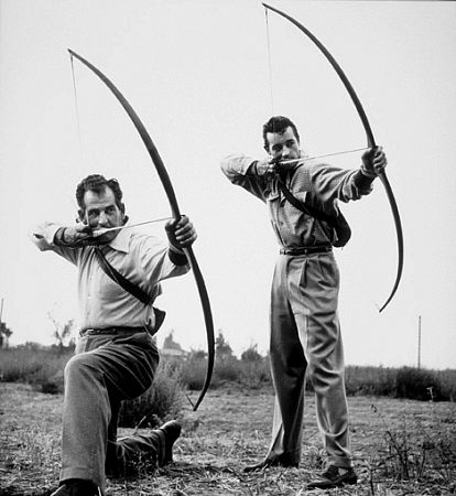 Guy Madison and his archery instructor, 1953.