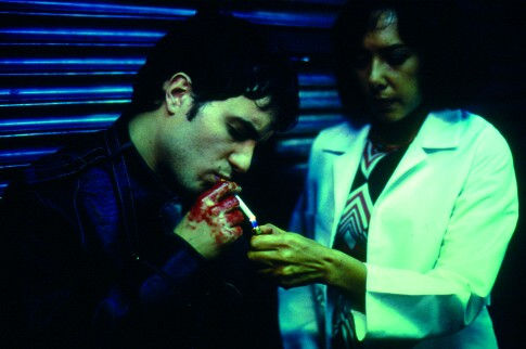 Still of Lucas Crespi and Carmen Madrid in Nicotina (2003)