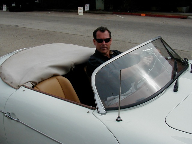 Mark Maine in Porsche on the set of The Month of August.