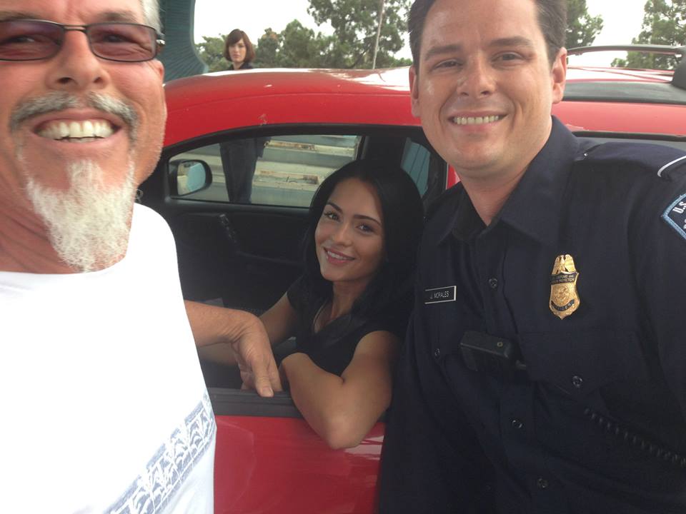 Mark Maine, Antoinette Kalaj, Jason Rogers and his Red Durango as a picture car driven by Antoinette, all on the set of La Migra