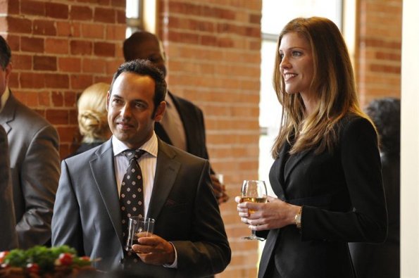 Shaun Majumder and Tricia Helfer in NBC's The Firm