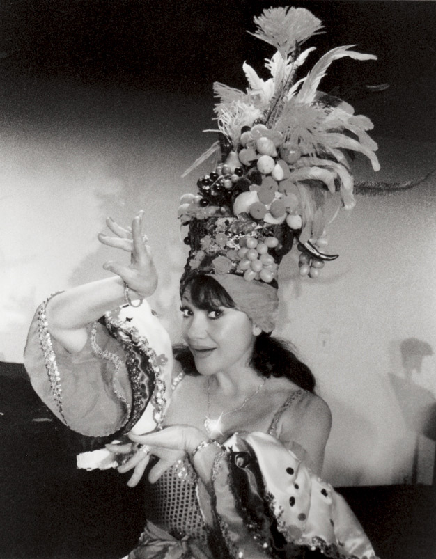 Irina Maleeva plays at being Carmen Miranda in her musical theater show 