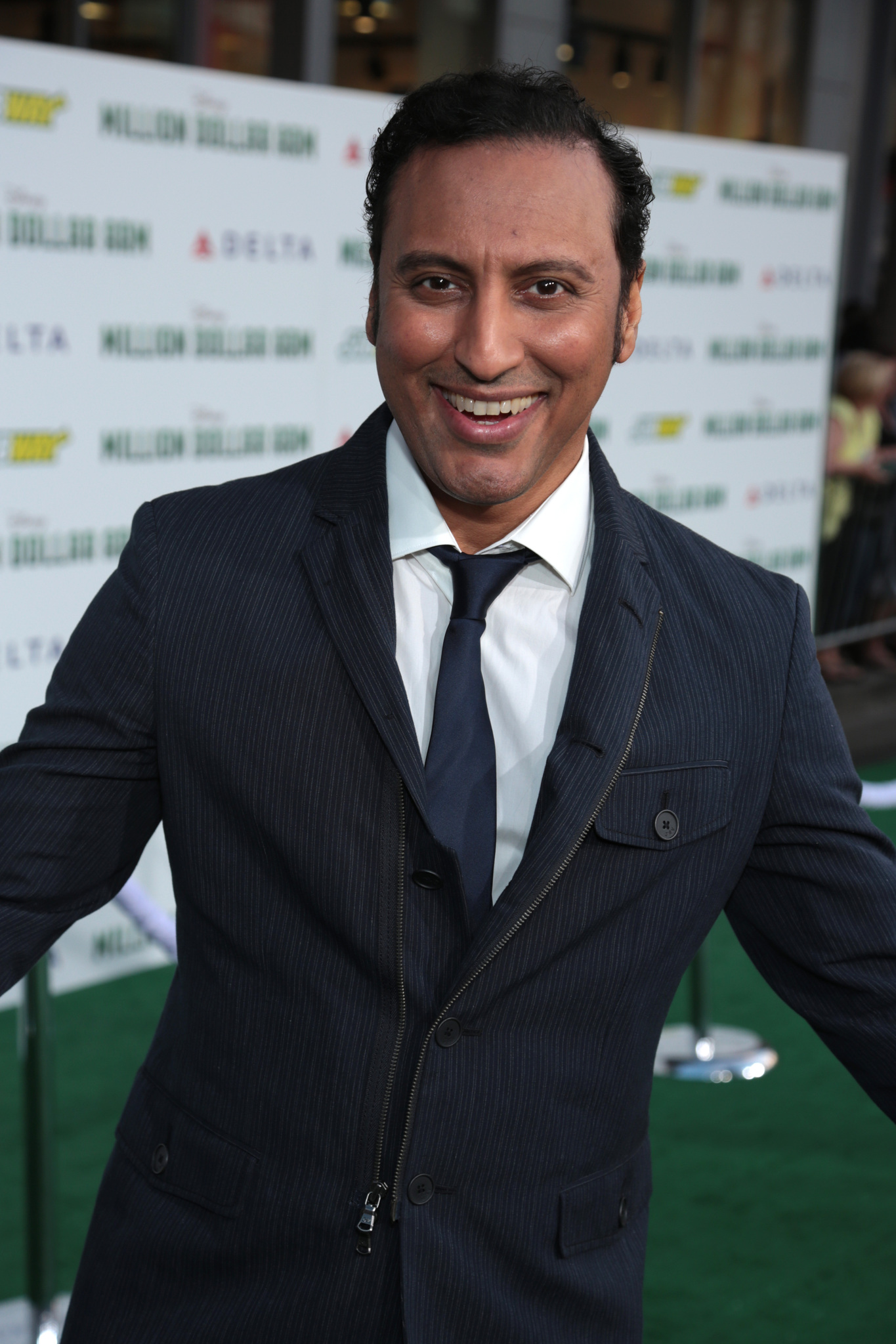 Aasif Mandvi at event of Million Dollar Arm (2014)