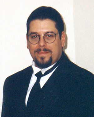 Mark L. Mangino