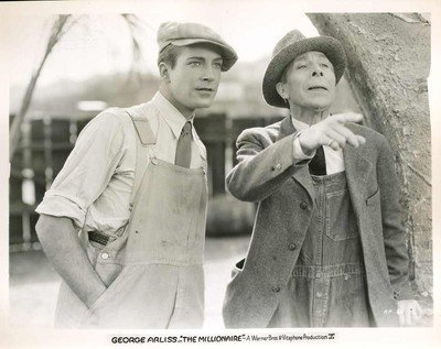 Still of George Arliss and David Manners in The Millionaire (1931)