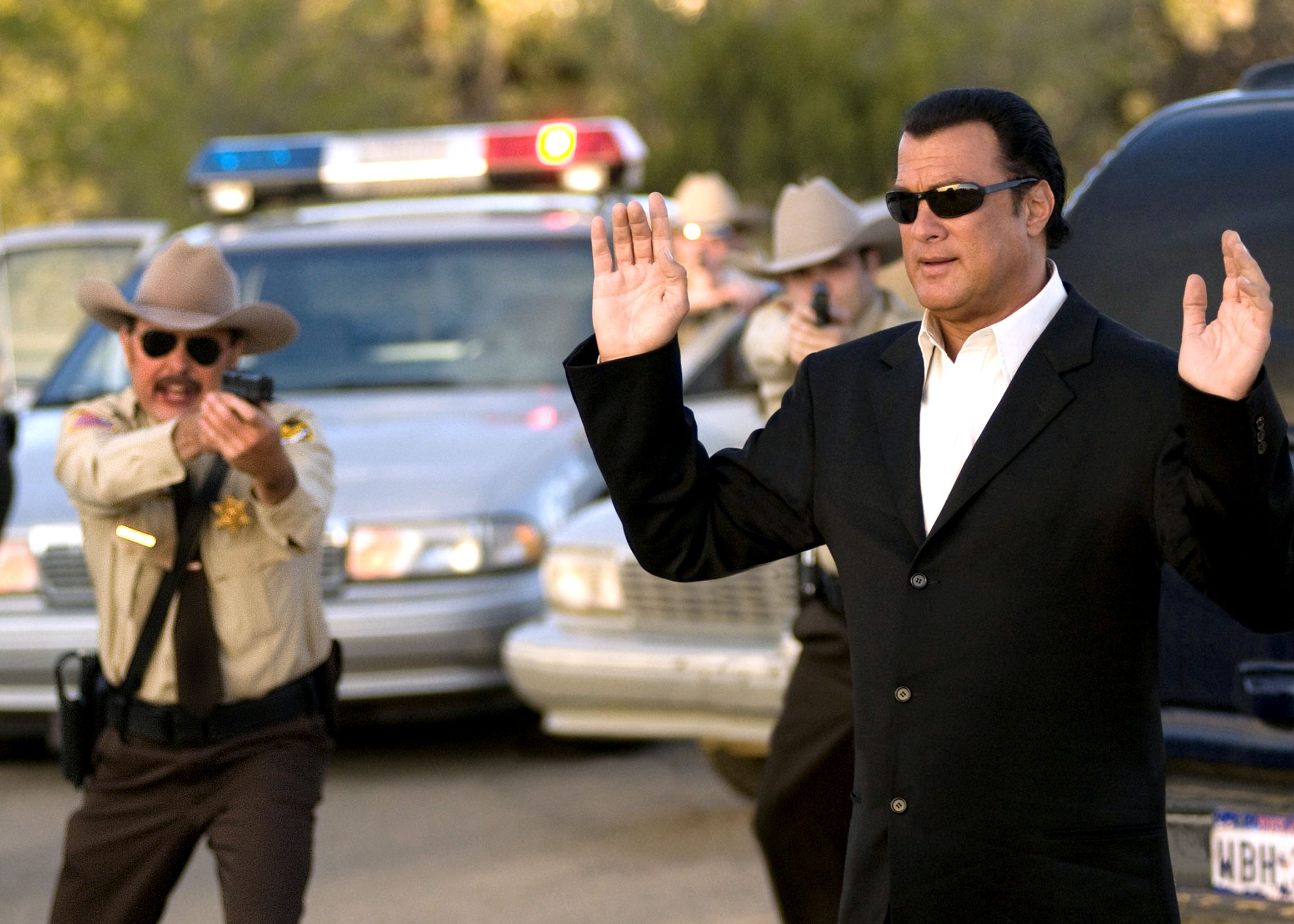 David Manzanares persuades Steven Seagal on the set of THE KEEPER, 2008