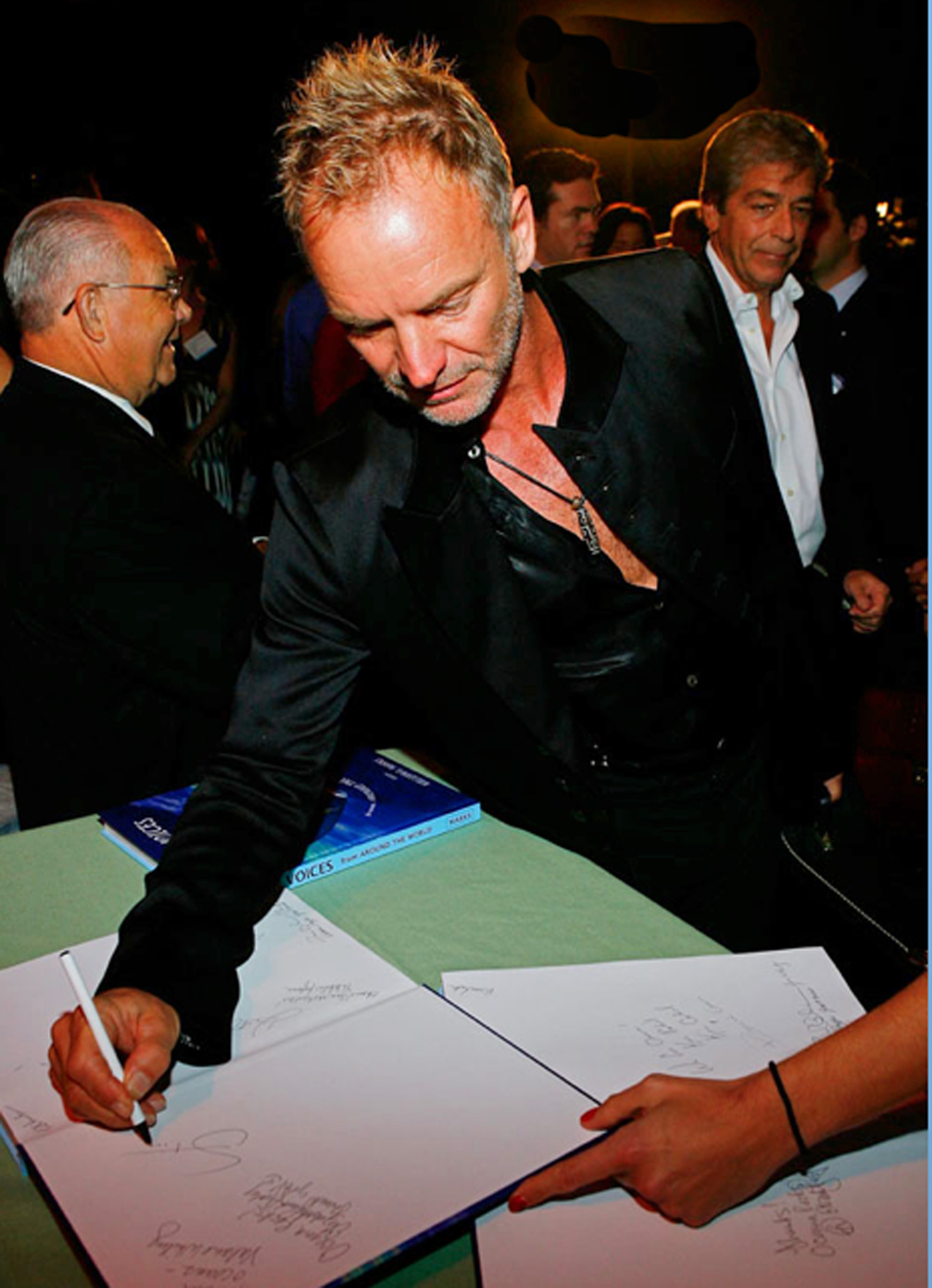 STING autographing William Waterway's book, 