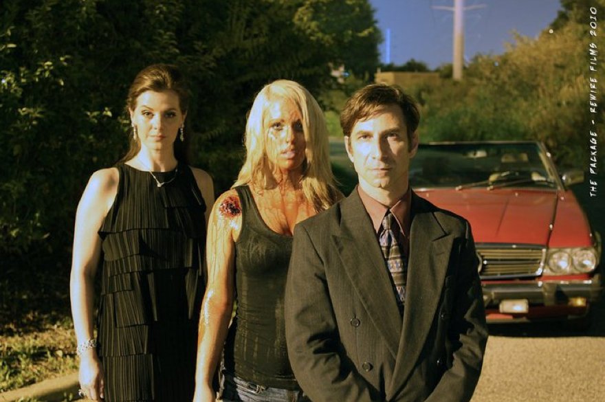 From Right, Ethan Marten (Mr. Jones), Brittany Colley (the Package), and Kera O'Bryon (Mrs. Jones) in Antonio Flores' The Package, 2010.