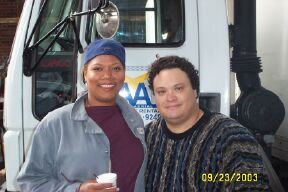 Queen Latifah and Adrian Martinez on the set of TAXI.