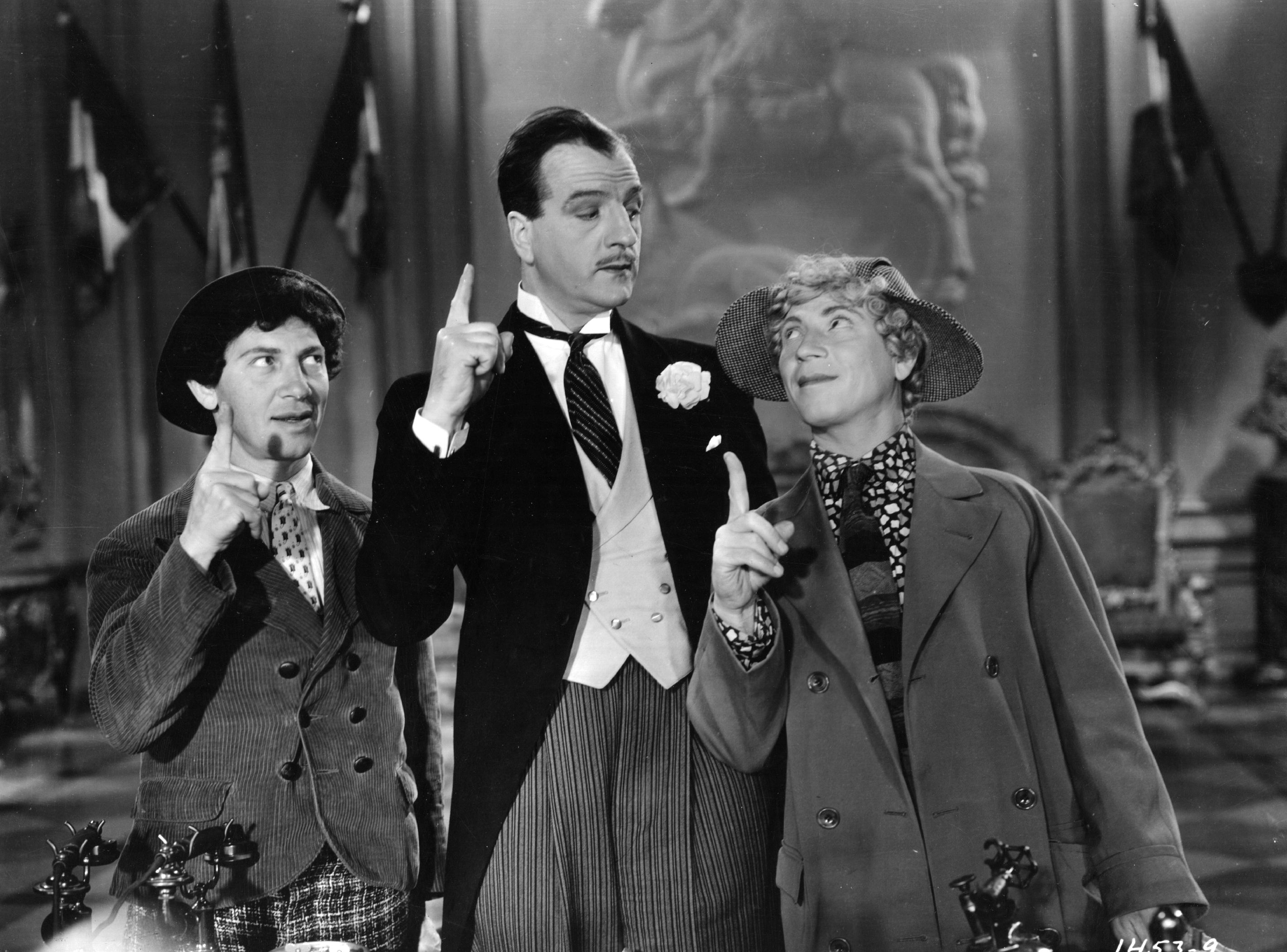 Still of Louis Calhern, Chico Marx and Harpo Marx in Duck Soup (1933)