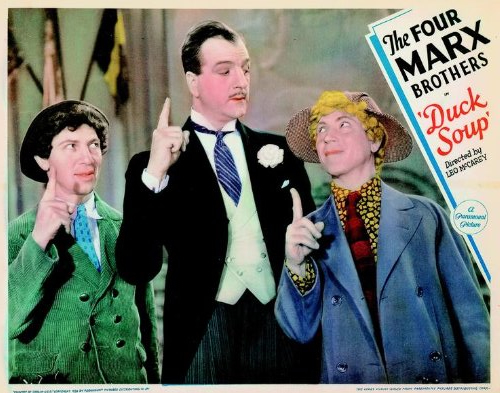 Louis Calhern, Chico Marx and Harpo Marx in Duck Soup (1933)