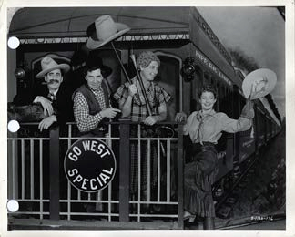 Groucho Marx, Diana Lewis, Chico Marx and Harpo Marx in Go West (1940)
