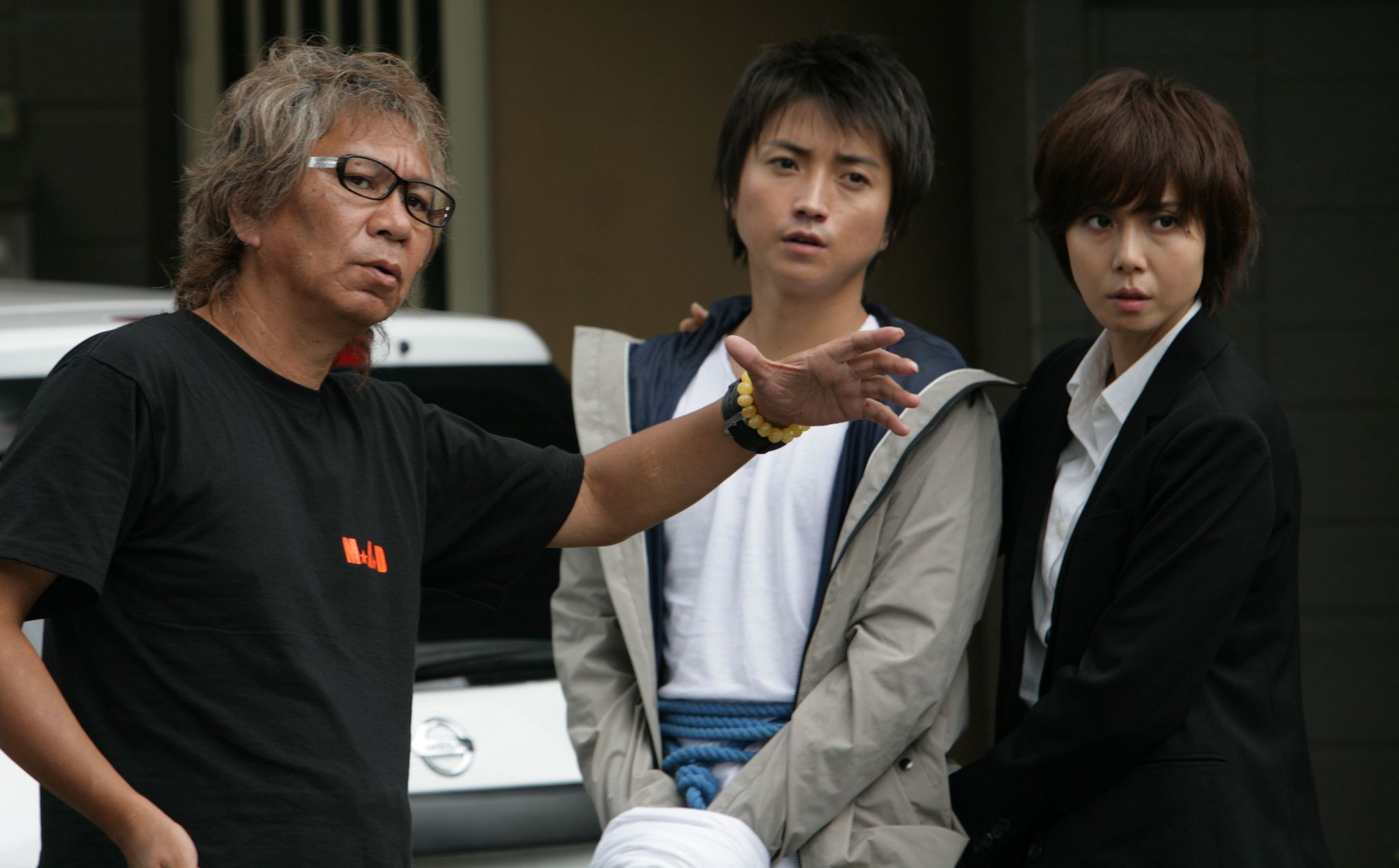 Still of Tatsuya Fujiwara, Nanako Matsushima and Takashi Miike in Wara no tate (2013)