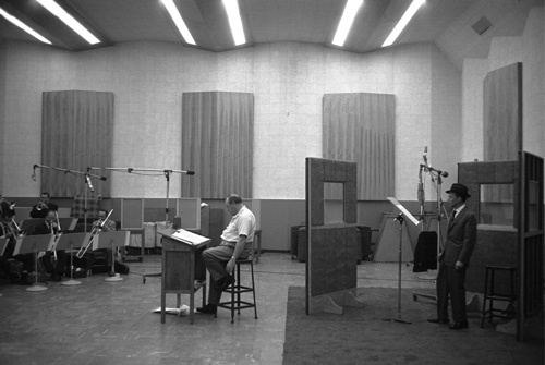 Frank Sinatra in the recording studio with Billy May circa 1959